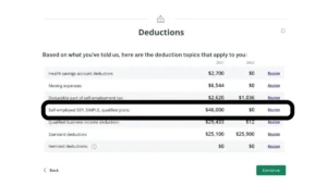 Tax forms and calculator on desk for 2025 tax planning