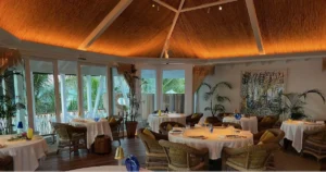 Upscale restaurant dining room with white tablecloths