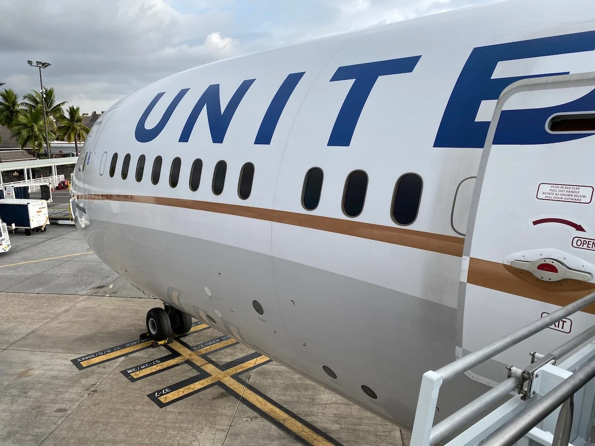 Aircraft business class cabin with rows of seats